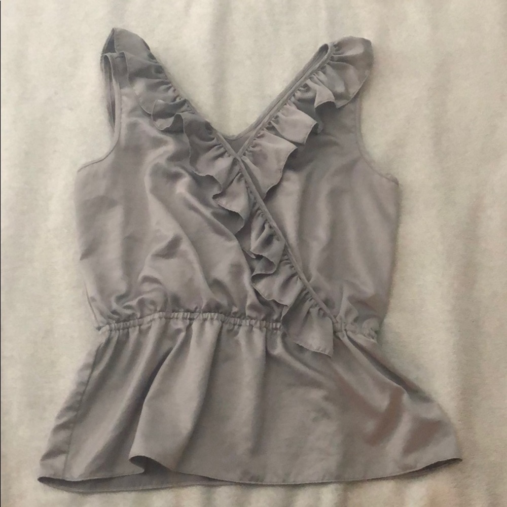 Green ruffled peplum blouse